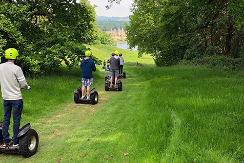 Segways with Leeds Castle backdrop